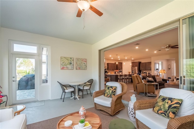 living room featuring ceiling fan