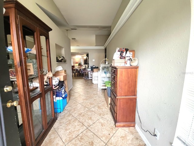 hall with light tile patterned flooring