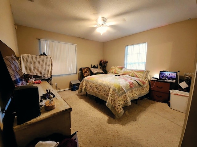 bedroom featuring carpet and ceiling fan