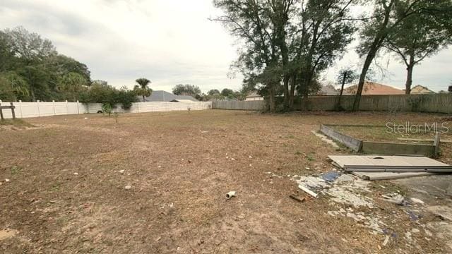 view of yard with fence