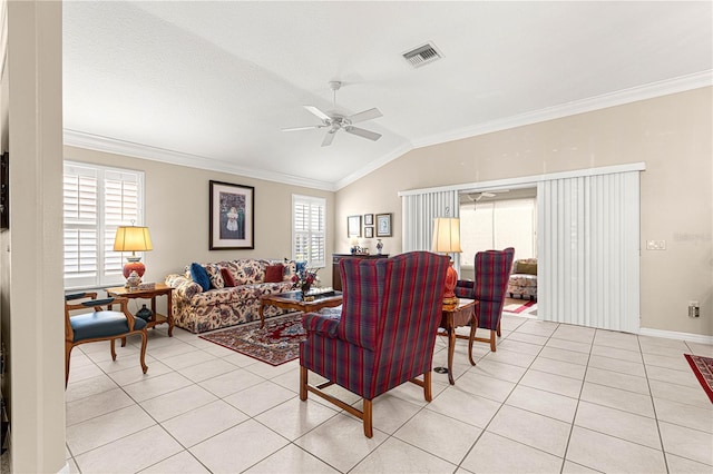 living room with ceiling fan, crown molding, light tile patterned flooring, and vaulted ceiling