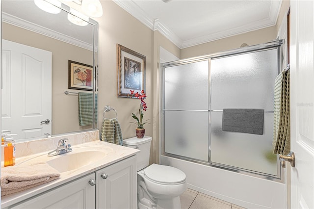 full bathroom with vanity, shower / bath combination with glass door, tile patterned floors, toilet, and ornamental molding