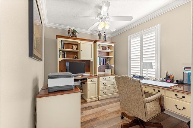 office featuring ceiling fan, crown molding, light hardwood / wood-style floors, and a textured ceiling