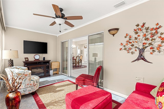 living room with a fireplace, ceiling fan, and crown molding