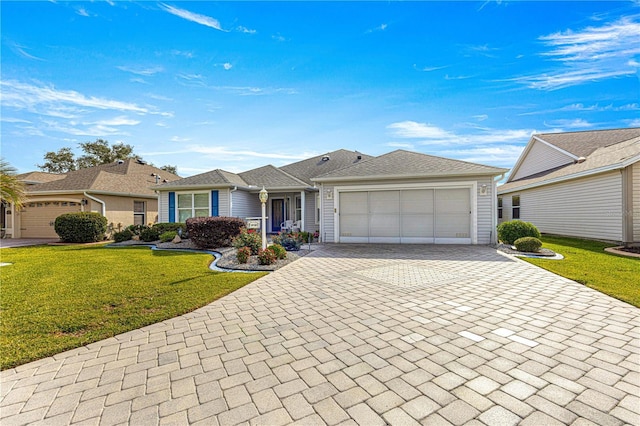 ranch-style home with a garage and a front yard