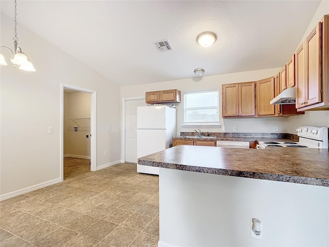 kitchen featuring lofted ceiling, white appliances, sink, hanging light fixtures, and a chandelier