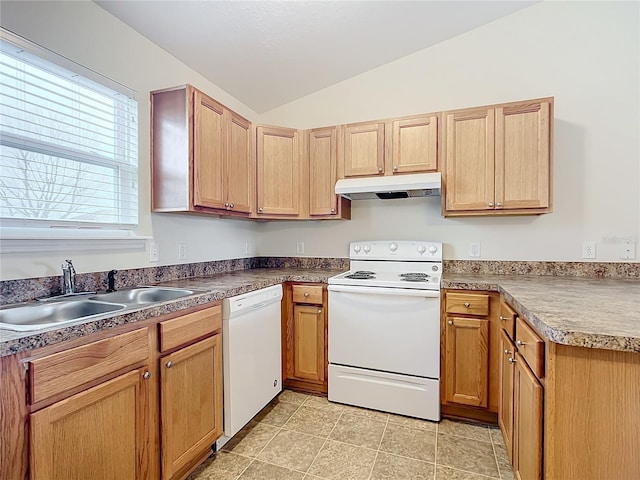 kitchen with white appliances, vaulted ceiling, and sink