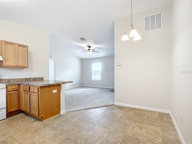 kitchen featuring decorative light fixtures, stove, kitchen peninsula, and ceiling fan with notable chandelier