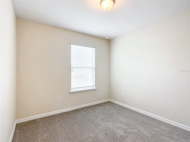 empty room with carpet flooring