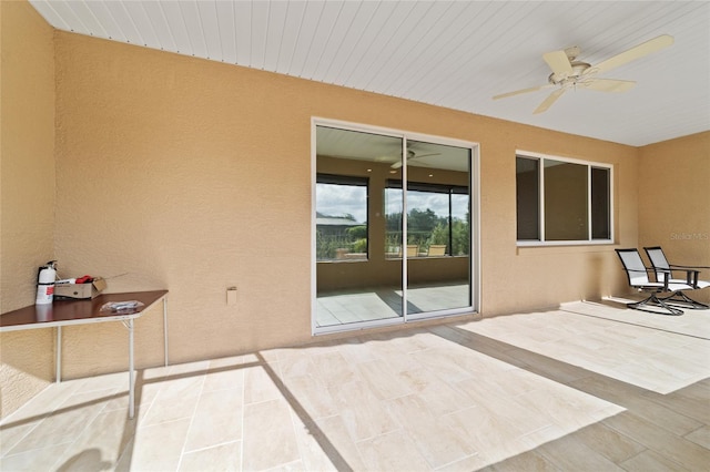 view of patio / terrace featuring ceiling fan