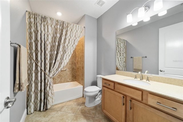 full bathroom featuring toilet, shower / bath combo, vanity, and tile patterned floors