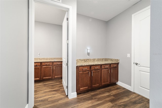 bathroom with wood-type flooring