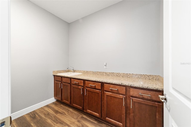 bathroom featuring wood-type flooring and vanity