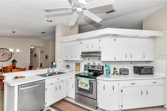 kitchen with white cabinets, appliances with stainless steel finishes, sink, and pendant lighting