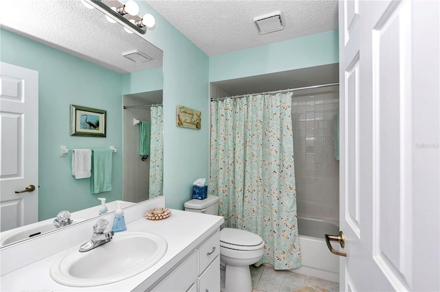 full bathroom with a textured ceiling, tile patterned flooring, vanity, toilet, and shower / bath combo