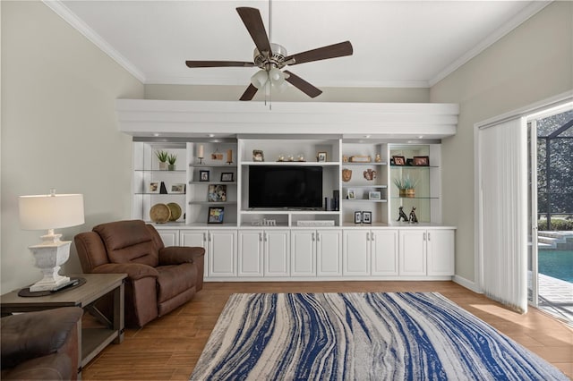 living room with ceiling fan, crown molding, and light hardwood / wood-style flooring