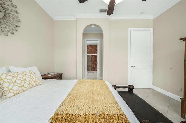 bedroom featuring ceiling fan, crown molding, and light tile patterned flooring