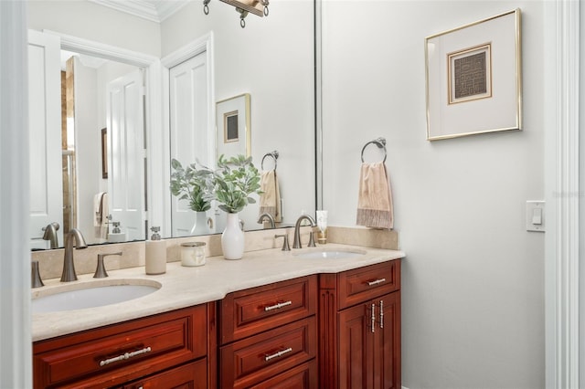 bathroom featuring vanity and crown molding