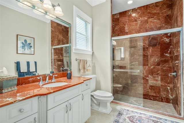 bathroom with tile patterned flooring, toilet, vanity, and walk in shower