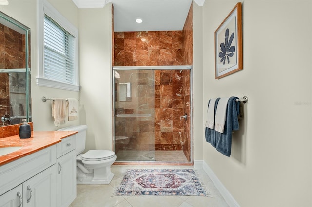 bathroom featuring toilet, tile patterned flooring, vanity, and walk in shower