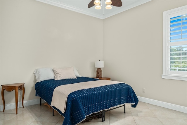 tiled bedroom featuring ceiling fan and ornamental molding