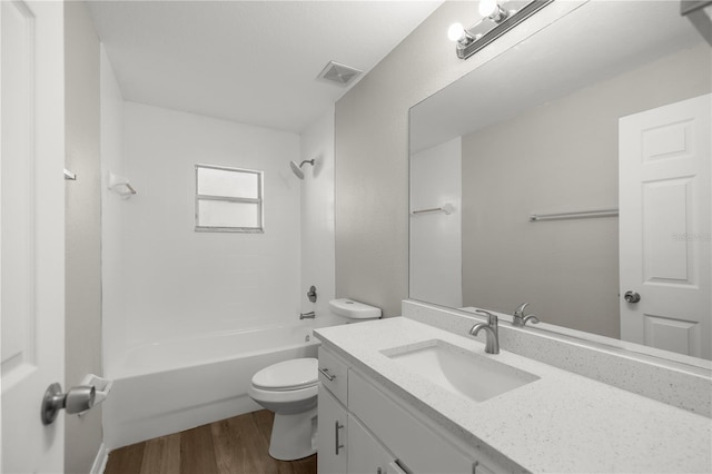 full bathroom with wood-type flooring, vanity, toilet, and shower / tub combination