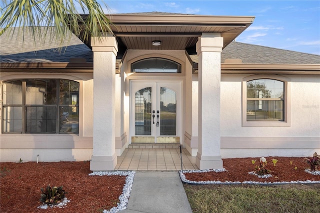 property entrance featuring french doors