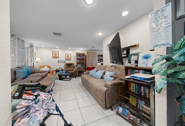 living room featuring light tile patterned floors