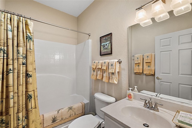 full bathroom with shower / bath combo with shower curtain, vanity, and toilet