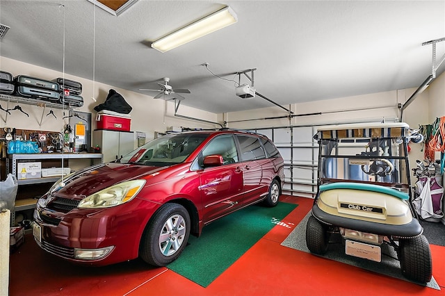 garage featuring ceiling fan and a garage door opener