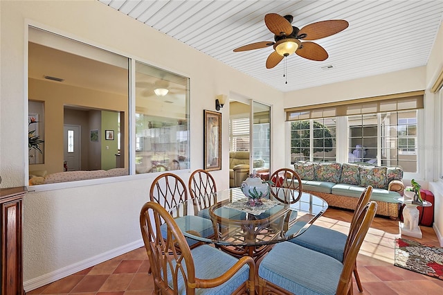 sunroom / solarium with ceiling fan