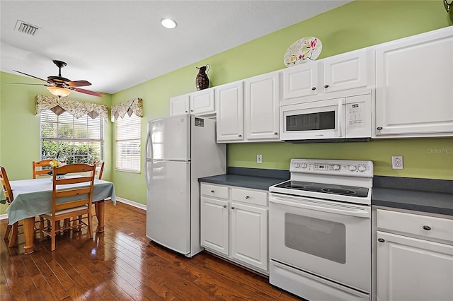 kitchen featuring ceiling fan, white cabinetry, white appliances, and dark wood-type flooring