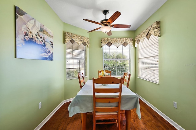 dining area featuring hardwood / wood-style floors and ceiling fan