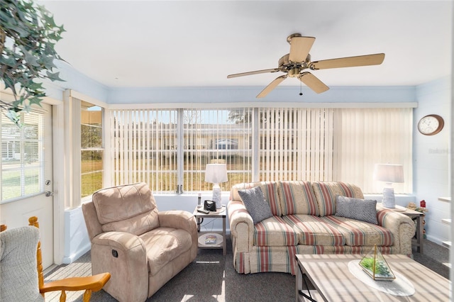 sunroom / solarium with ceiling fan