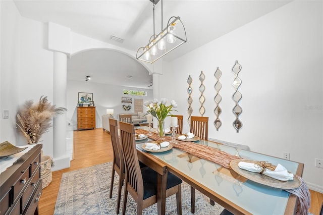 dining room with light hardwood / wood-style flooring