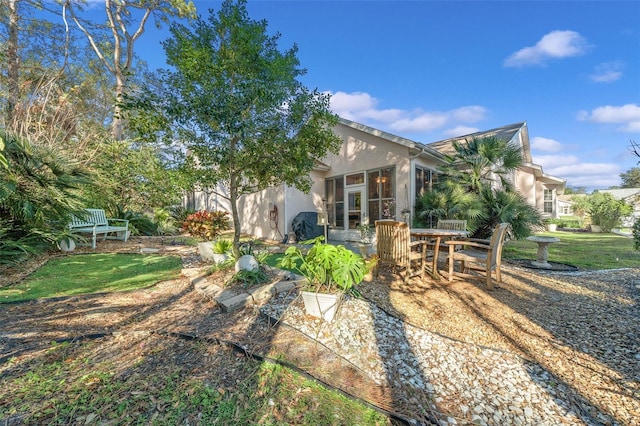 back of house featuring a patio area