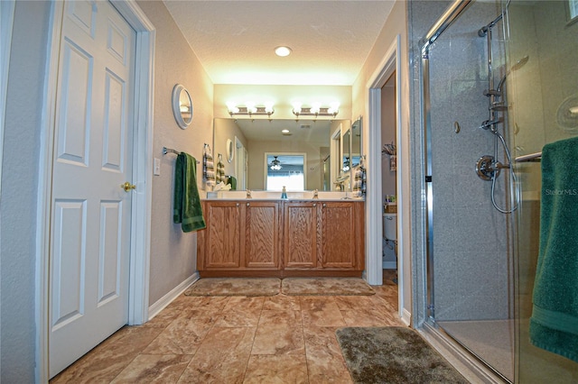 bathroom with vanity and walk in shower