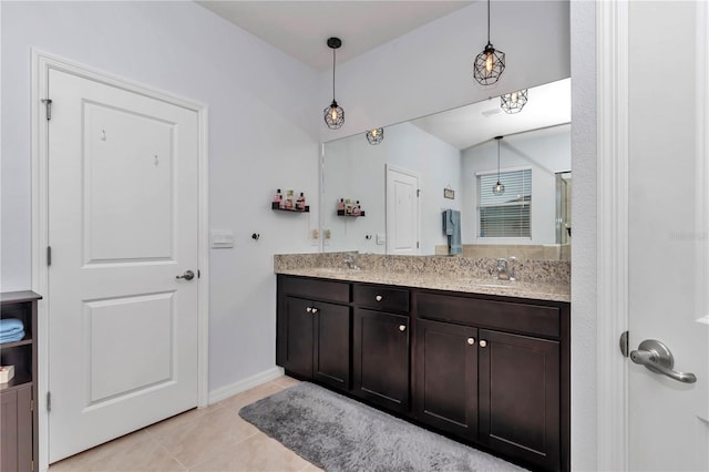 bathroom with vanity and tile patterned floors