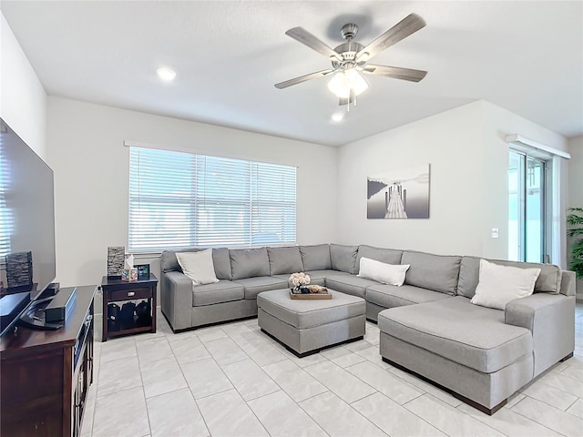 living room featuring ceiling fan