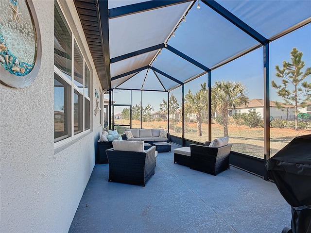 sunroom / solarium featuring vaulted ceiling