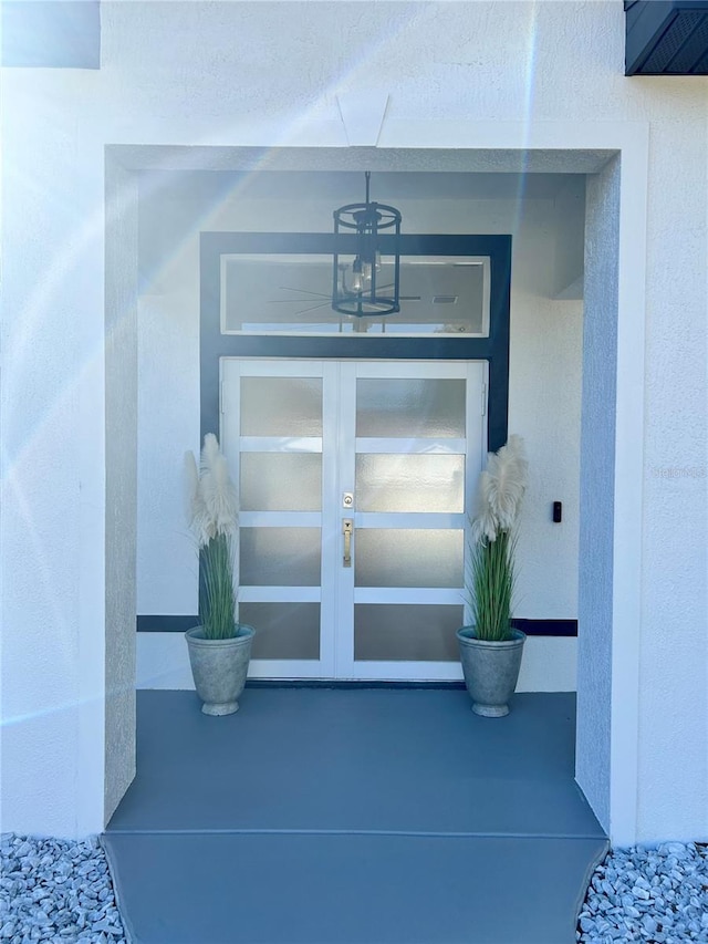 doorway to property featuring french doors