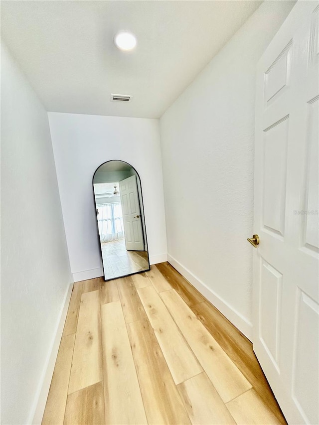 empty room featuring wood-type flooring