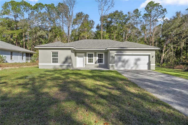 single story home featuring a garage and a front lawn