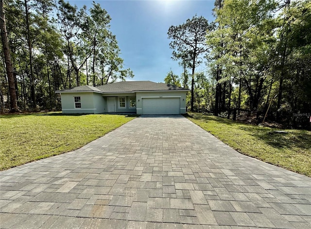 10651 N Mataro Ave, Citrus Springs, FL 34434 - ranch-style home featuring stucco siding, a garage, a front lawn, and decorative driveway