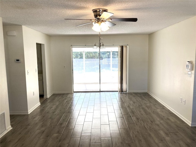 empty room featuring a textured ceiling and ceiling fan