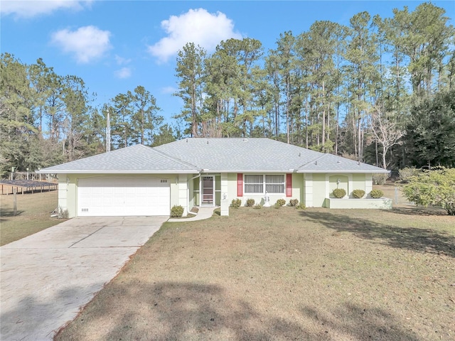 single story home with a garage and a front lawn