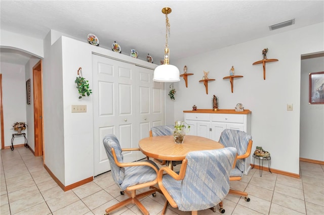 dining room featuring light tile patterned floors