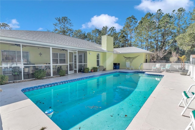 view of pool featuring ceiling fan and a patio