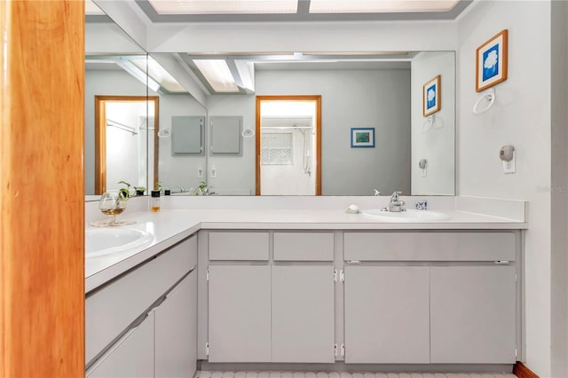 bathroom with vanity and walk in shower