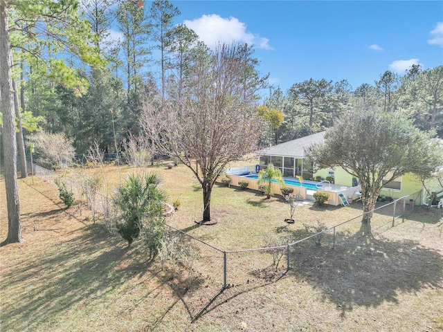 view of yard featuring a sunroom